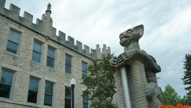 Stuck by lightning on Oct. 14, 1966, NIU’s iconic “Olive Goyle” grotesque celebrates 60 years of misfortune and campus folklore with a face full of smiles.