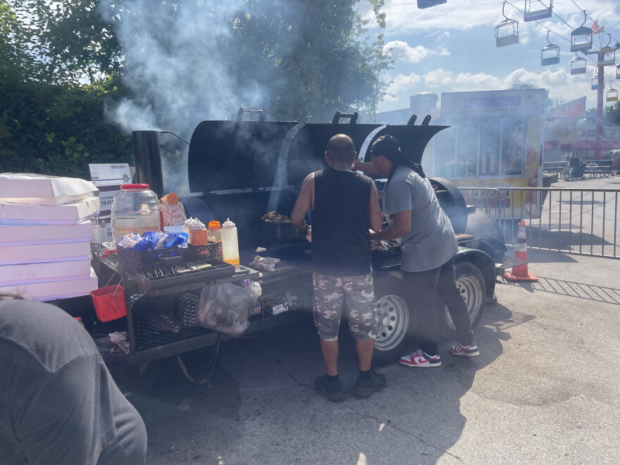 Food vendors at the Puerto Rican Festival of Wisconsin smoke meats as the festival grounds open on Sept. 12, 2026.