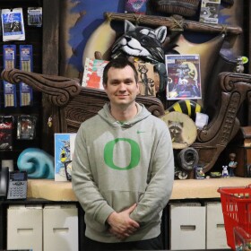 Richard Goosman stands behind the counter at Radar Toys in this December 2025 picture