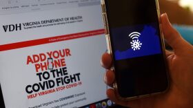 In this photo illustration a COVIDWISE logo is displayed on a mobile phone screen in Arlington, Virginia, amid the novel coronavirus pandemic.