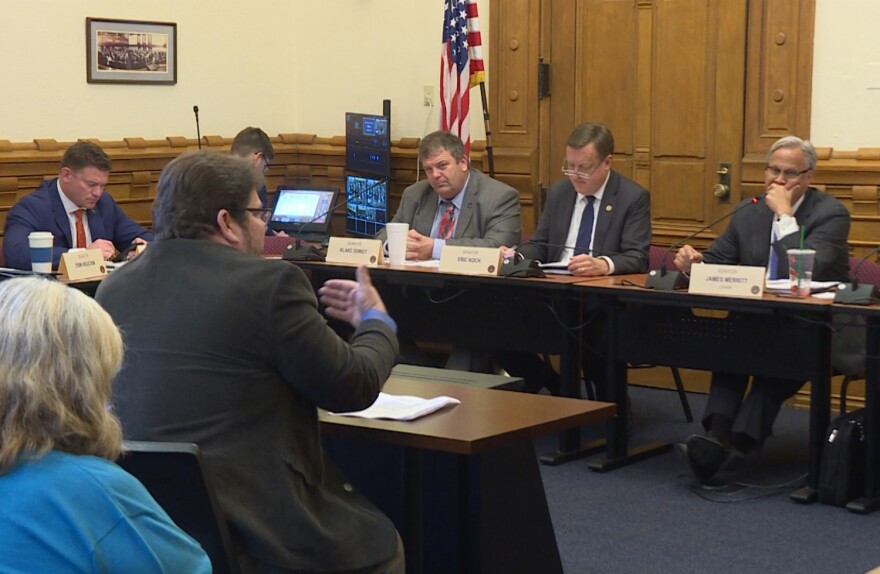 The Citizens Action Coalition's Kerwin Olson expresses his opposition to the TDSIC bill in front of the Senate Utilities committee.