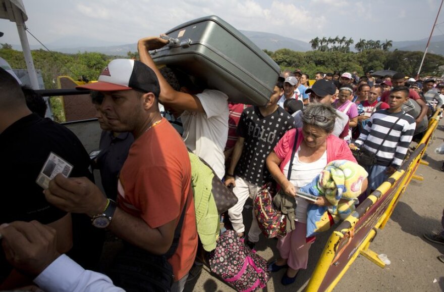 Venezuelan refugees crossing the border into Colombia this year.