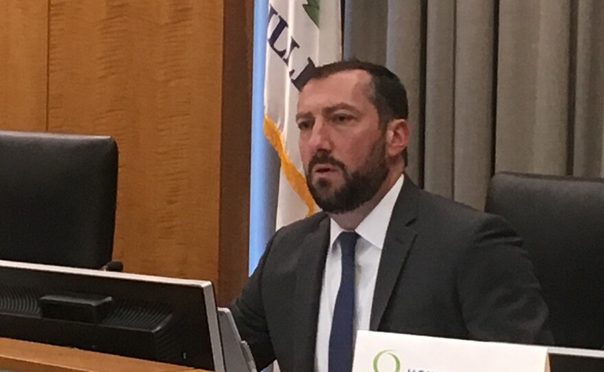 Ryan Whitehouse seated
