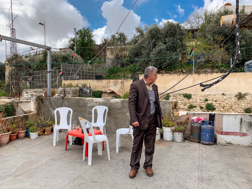 Mufid Sharabati, a Palestinian, on his roof in Hebron.