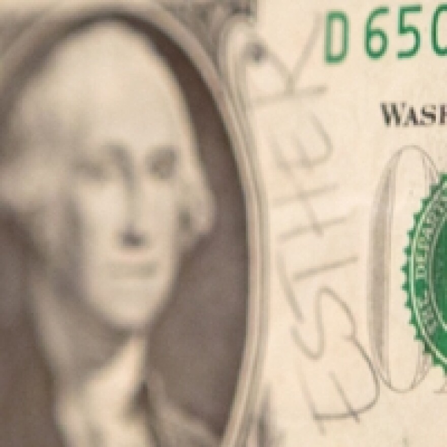 dollar bill with "Esther" written on side
