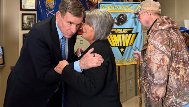 The day before announcing his reelection campaign in March, U.S. Sen. Mark Warner, D-Virginia, meets with Vonda Robinson, president of the National Black Lung Association as well as United Mine Workers of America representatives, healthcare workers, lawyers and miners at the UMWA office in Castlewood, Virginia.