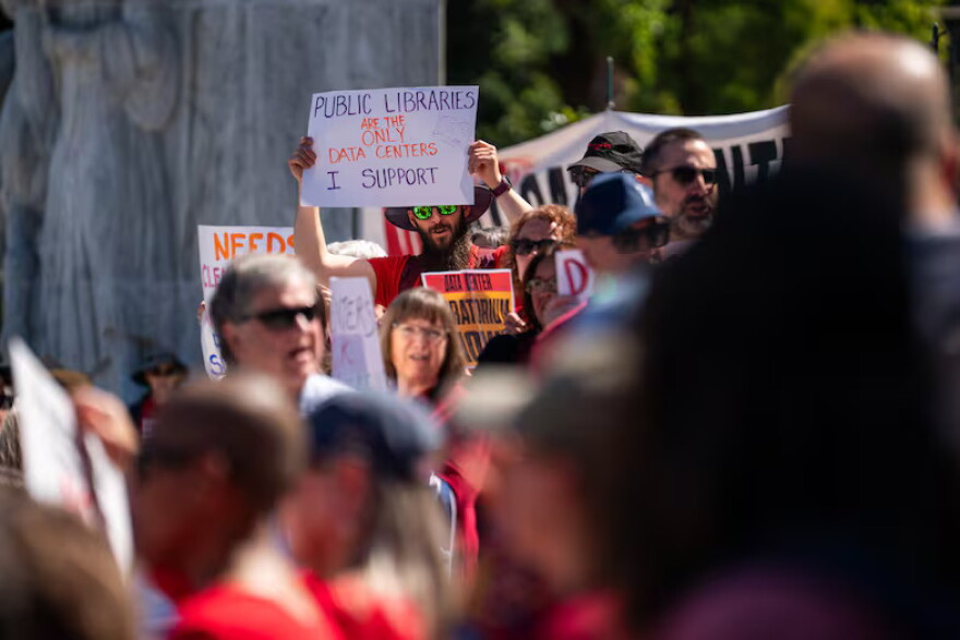 Attendees chant at a rally advocating for a statewide data center moratorium, held at the Oregon State Capitol on Tuesday, Sept. 8.