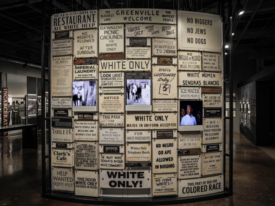 Segregation posters are on display at the Legacy Museum in Montgomery, Ala. "The great evil of American slavery wasn't involuntary servitude," Stevenson says. "It was this idea, this narrative, that black people aren't as good as white people."