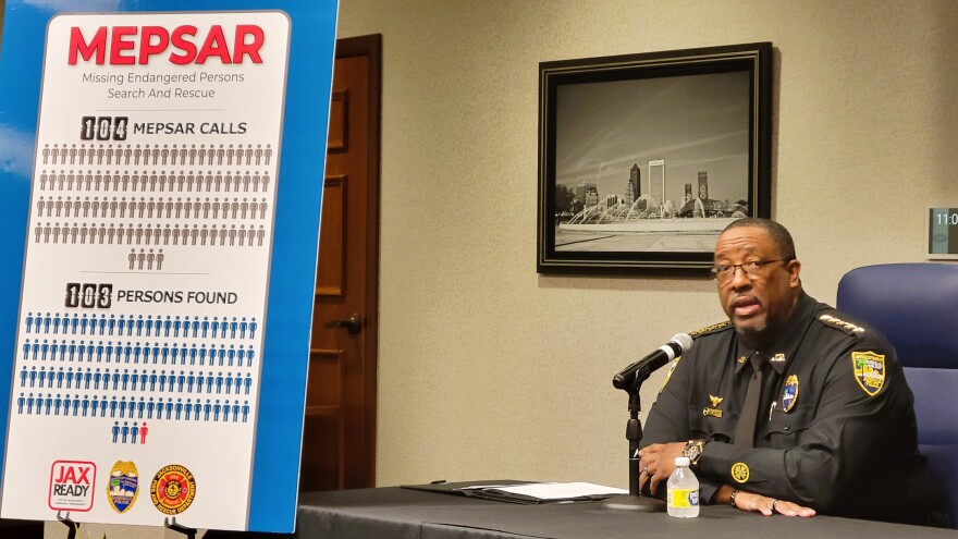 Jacksonville Sheriff T.K. Waters speaks about a new ID program next to statistics showing the success of an almost 2-year-old ,issing persons program.