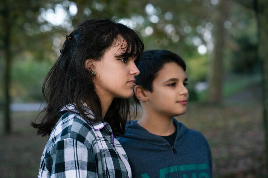 Sofia (left) and André Oliveira first grew anxious about climate change in the summer of 2017 when an intense heatwave was baking Portugal. Adults "can see us as serious or they can see us as a joke," Sofia says. "A lawsuit," André adds, "is not a joke."