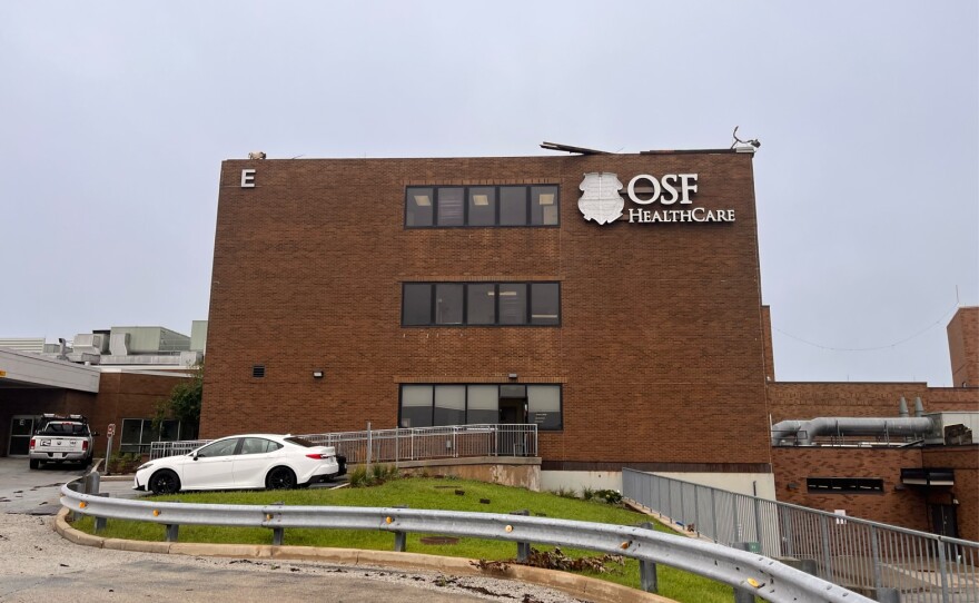 Roof damage at OSF St. Joseph Medical Center in Bloomington led to the hospital closing to trauma. Ambulances are being diverted elsewhere.