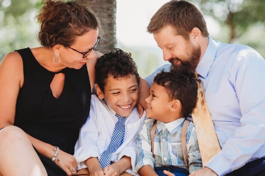 Thomas Conroy pictured with his wife and two sons. Conroy was the third person to receive a heart transplant at UR Medicine Strong Memorial Hospital twenty-five years ago.