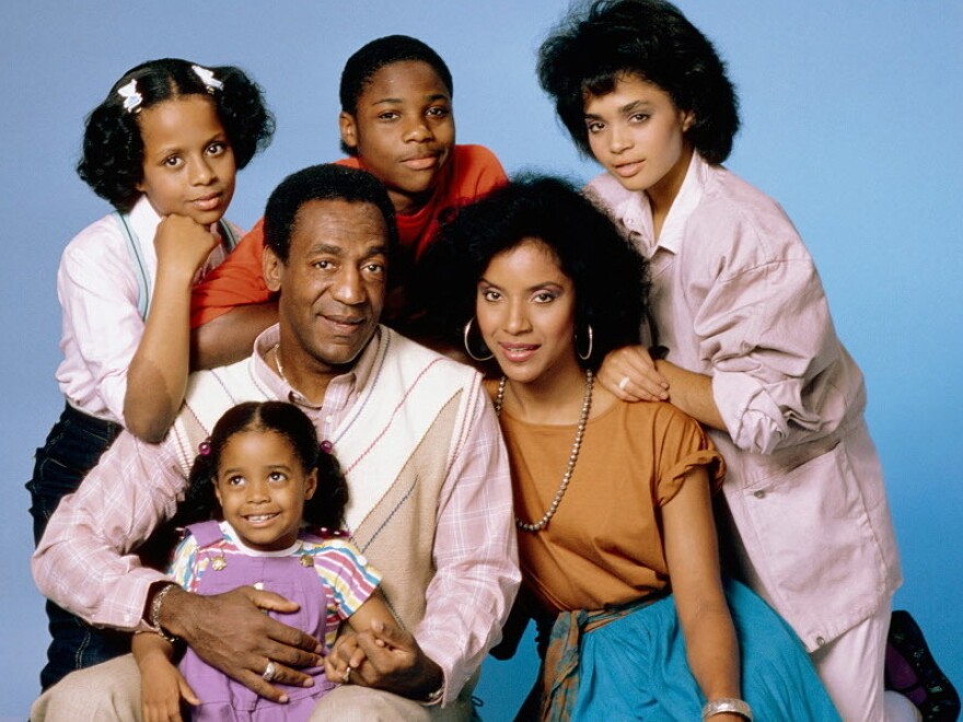 Bill Cosby with the cast of his hit sitcom<em> The Cosby Show: </em>Tempestt Bledsoe (clockwise from top left), Malcolm-Jamal Warner, Lisa Bonet, Phylicia Rashad and Keshia Knight Pulliam.