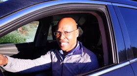 State Representative John Lovick in his car. The former state trooper and Snohomish County Executive offered to drive a reporter around in the early morning to demonstrate a particular form of suffering felt by commuters North of Seattle.