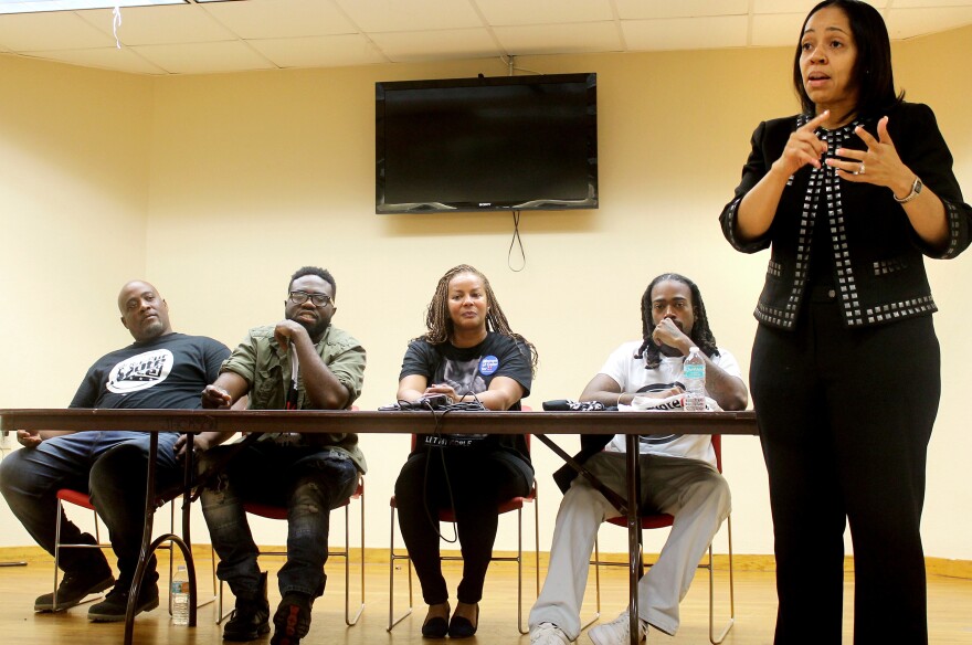 Aramis Ayala moderates a panel of community leaders at a get-out-the-vote event in a predominantly black neighborhood in Orlando, Fla.