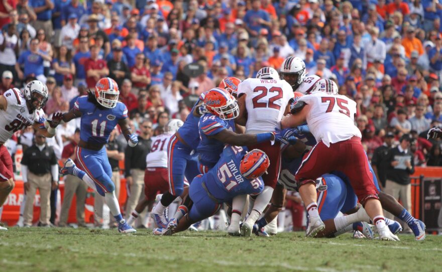 The Gator defense swarms Wilds.