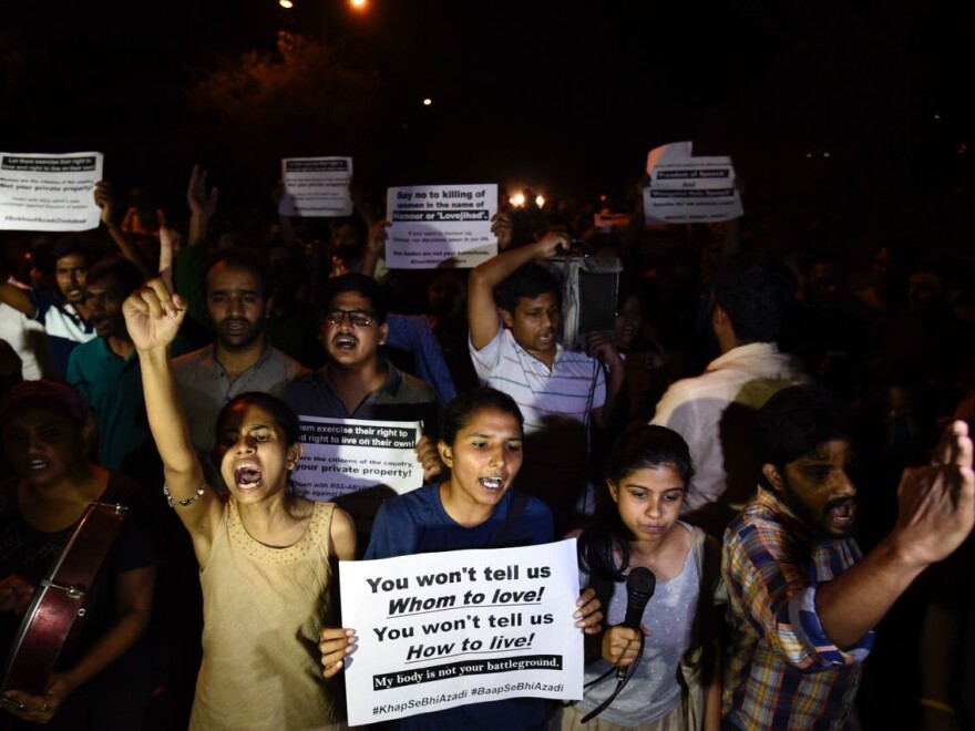 Members of Jawaharlal Nehru University Students' Union march against the screening of the film <em>In the Name of Love - Melancholy of God's Own Country</em>, in New Delhi, on April 28, 2018. The protesters accused the film of spreading hate through the conspiracy theory known as "love jihad."