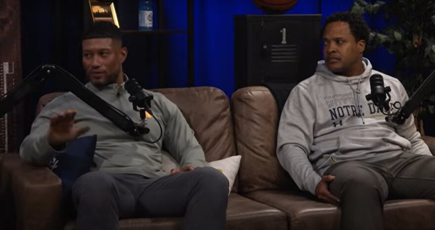 Notre Dame football Coach Marcus Freeman, left, and football General Manager Mike Martin talk recently on the university's Wake Up the Echoes podcast.