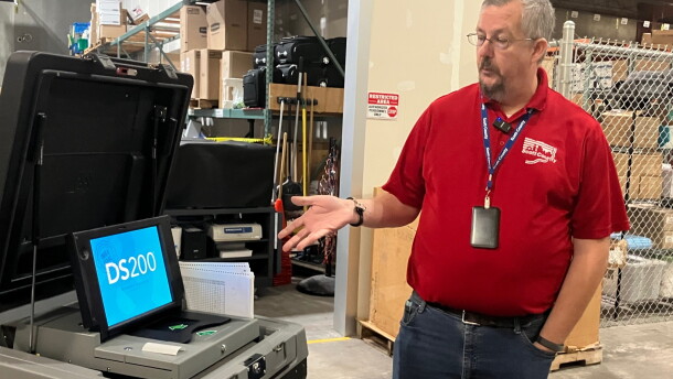 Scott County elections manager James Martin gets ready to show how an election voting machine works, at the county building in Eldridge, Thursday, Oct. 8, 2026.