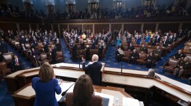 President Joe Biden delivers his first State of the Union address to a joint session of Congress at the Capitol, Tuesday, March 1, 2022, in Washington, as House speaker Nancy Pelosi of Calif., and Vice President Kamala Harris, applaud. (Shawn Thew/Pool via AP)