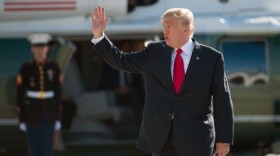 President Donald Trump waves as he boards Airforce One after the G20 Summit in Hamburg, Germany, July 8, 2017.
(Saul Loeb/AFP/Getty Images)