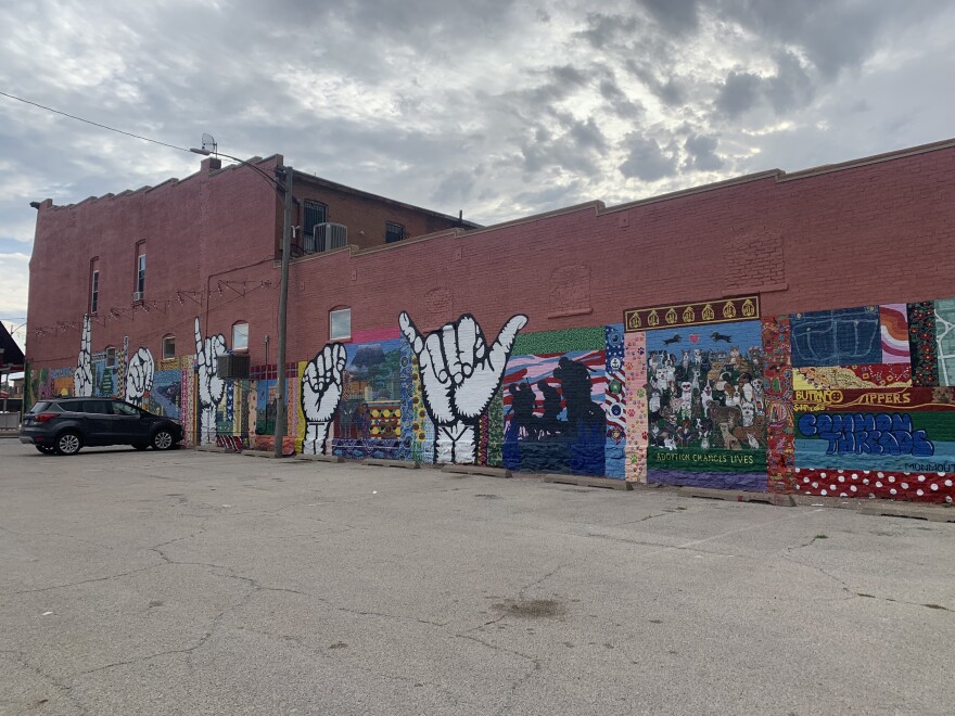 The Common Threads Community Mural is on the east side of the United Way of Greater Warren County in downtown Monmouth.