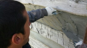 Traditionally log cabin are restored through a process of chinking and daubing 
