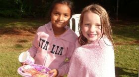 The author's daughter, right, with her friend Banita. The two girls lived next door to each other in Nairobi.