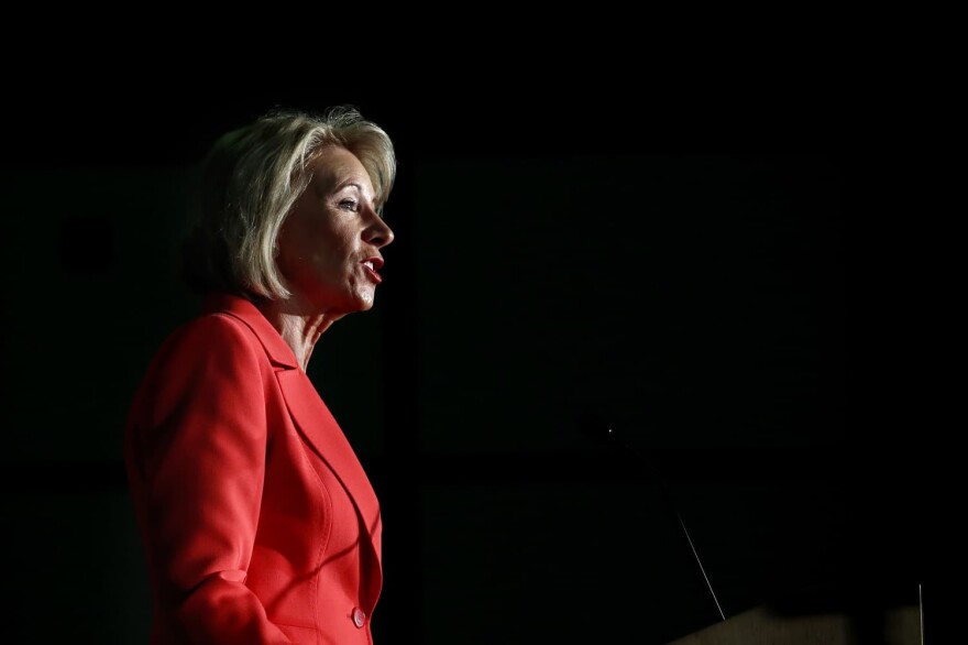 Education Secretary Betsy DeVos speaks Thursday, Sept. 7, 2017, at George Mason University Arlington, Va., campus. DeVos on declared that "the era of 'rule by letter' is over" as she announced plans to change the way colleges and university handle allegations of sexual violence on campus.  (AP Photo/Jacquelyn Martin)