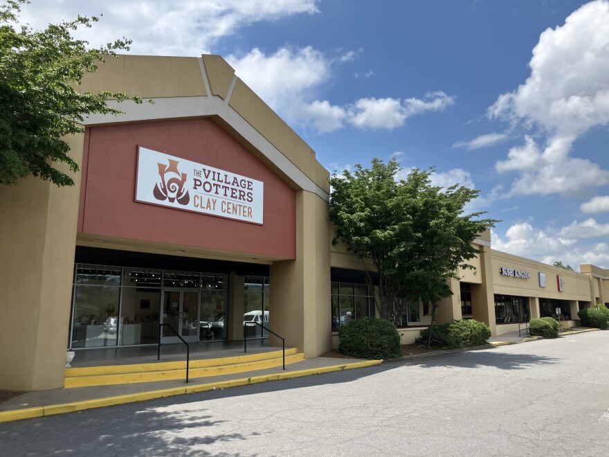 The Village Potters, one of several businesses located in Asheville's Westgate Shopping Center, as seen on Tuesday, July 7, 2026.