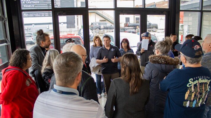 Erik King, Wexford County emergency manager, speaks to a crowd of disaster relief officials and volunteers ahead of the town hall meeting centered on flood recovery in Cadillac, Michigan, on Wednesday, April 29, 2026.