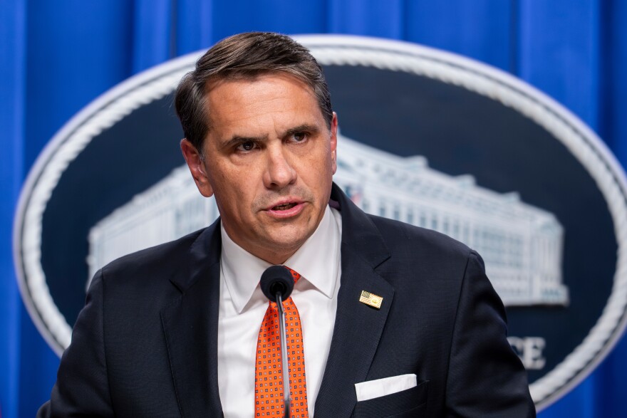 Acting Attorney General Todd Blanche speaks at a news conference at the Justice Department in Washington, April 7, 2026.