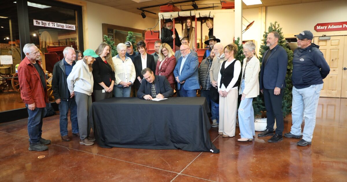 Rhoden signs gambling revenue adjustment, cigar bar bills into law