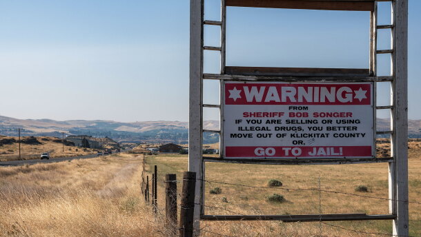 A sign along Highway 197 warns drivers in Klickitat County, Washington that anyone selling or using drugs in the county will go to jail.