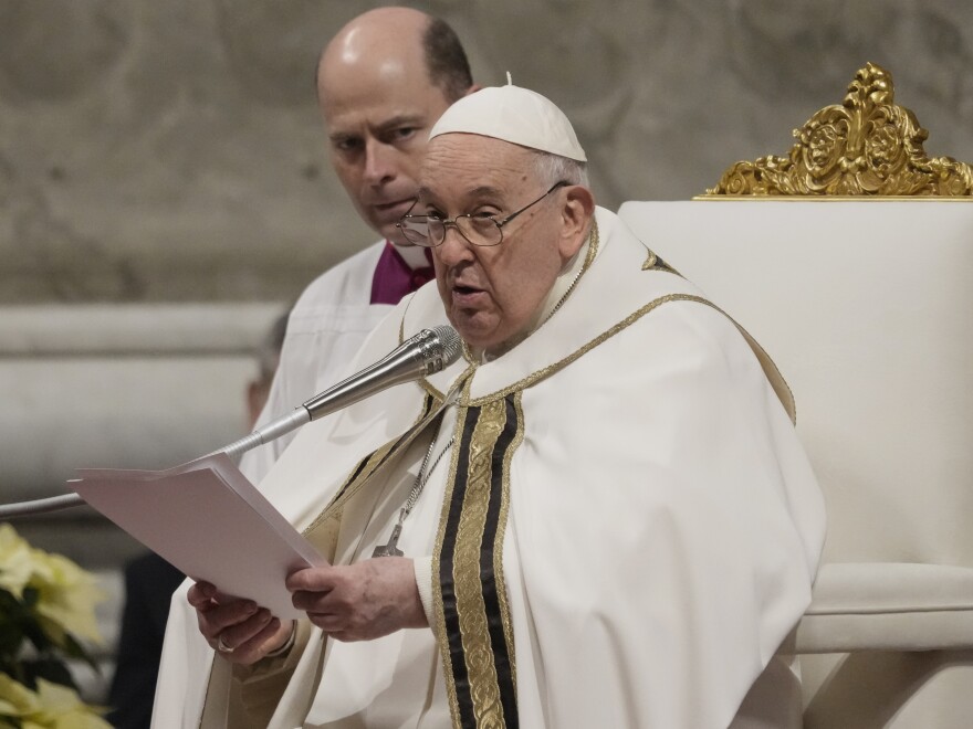 Pope Francis presides over Christmas eve Mass, at St. Peter's Basilica at the Vatican, Sunday Dec. 24, 2023.