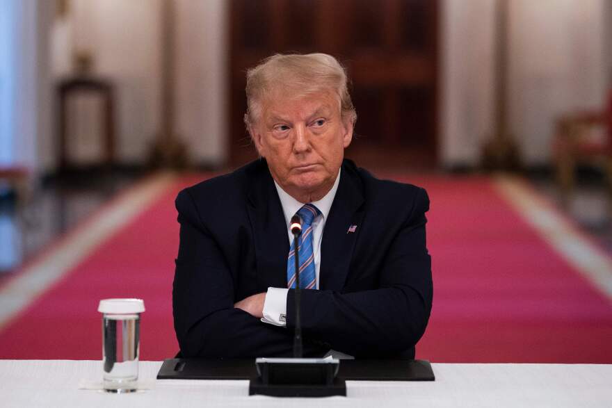 President Trump participates in a White House event Tuesday on how to reopen schools safely. After insisting that the Republican National Convention should be in person with thousands of people, Trump said he is "flexible" about the format.