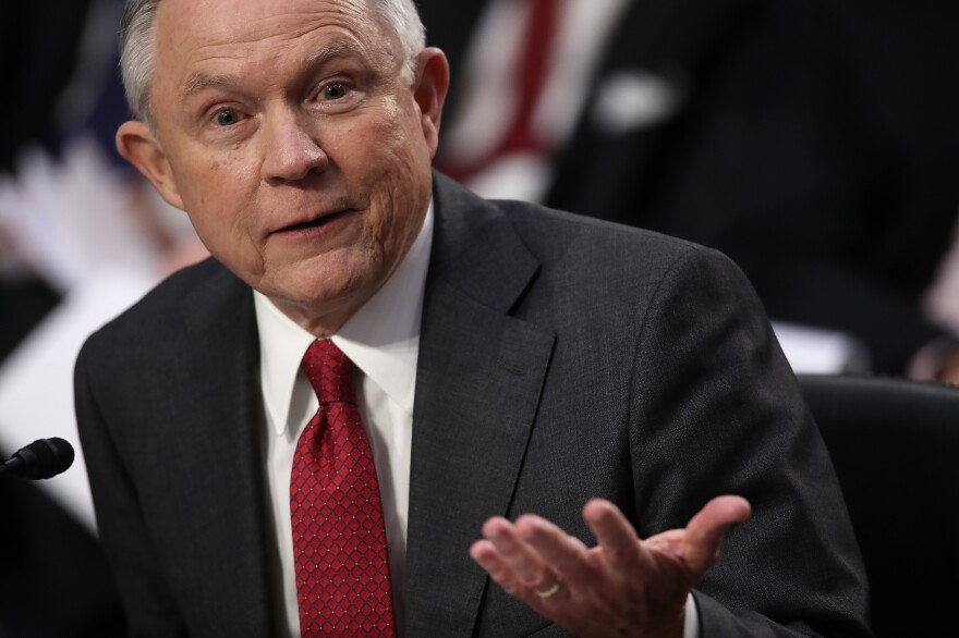 Attorney General Jeff Sessions testifies on Capitol Hill in June. He said he was unaware of any contacts between the Trump campaign and Russia, but court documents released this week show otherwise.