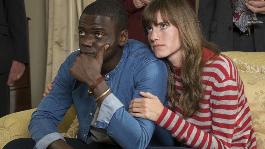 Guess Who's Coming To Dinner And Never Leaving: Chris (Daniel Kaluuya) and Rose (Allison Williams) in <em>Get Out</em>.