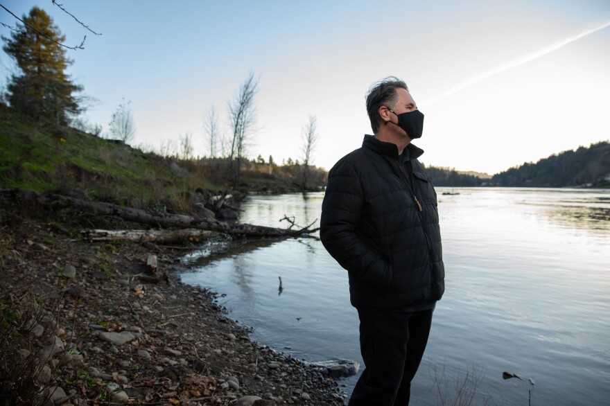 Joel McLemore of Milwaukie, Ore., looks at the Willamette River near his home in suburban Portland, Ore. McLemore moved to Oregon in April to pursue new employment opportunities after his divorce.