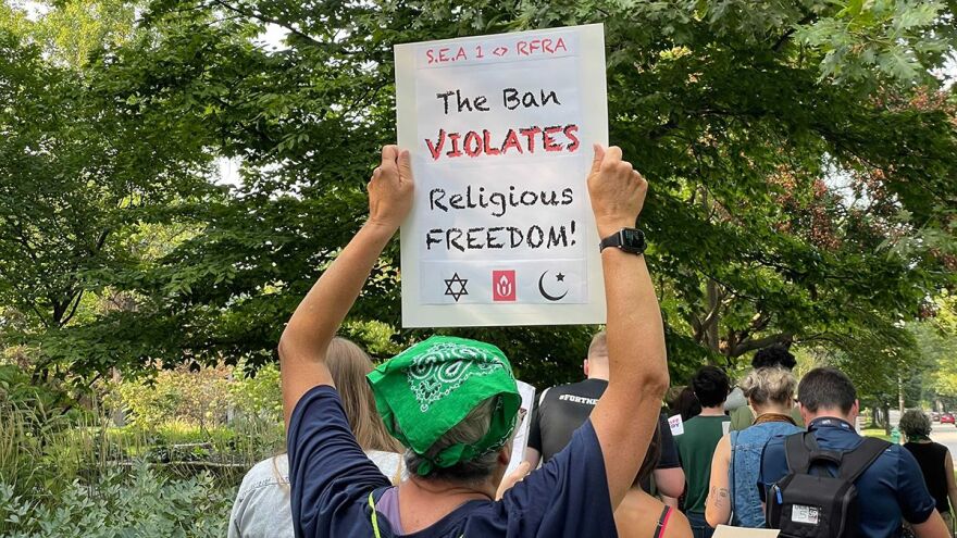 One group of abortion rights supporters marched from Tarkington Park to the governorâs mansion where they joined other protesters. (Darian Benson/WFYI)