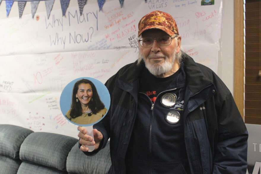 Douglas Norbeck holds a Mary Peltola sign during a campaign event on Wednesday, Oct. 28, 2026 in Soldotna, Alaska.