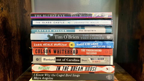 A stack of books that have been banned or challenged.