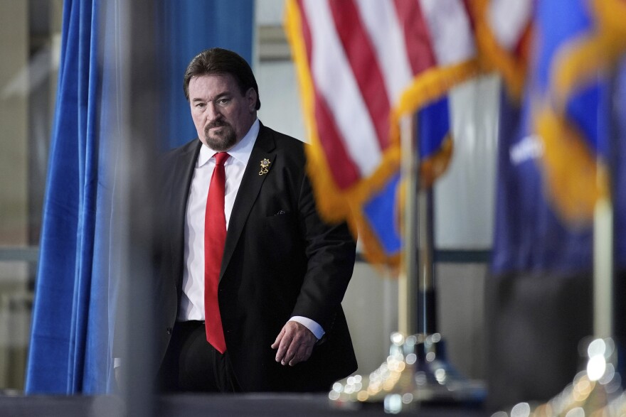 FILE - Nevada GOP chair Michael McDonald walks on stage before speaking ahead of Republican presidential candidate former President Donald Trump at a campaign event Jan. 27, 2024, in Las Vegas.