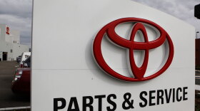 A sign for the parts and service department is shown at a new Toyota dealership in Oakland, Calif.