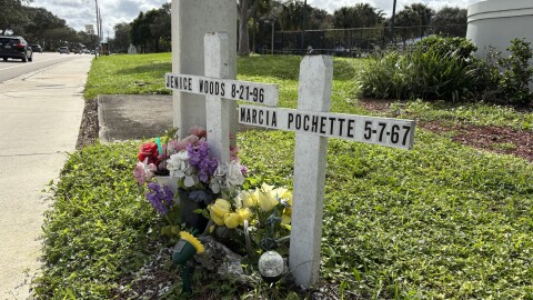 Memorial markers for Jenice Woods and Marcia Pochette on Congress Avenue, near Meadows Park, in Boynton Beach in December 2025.