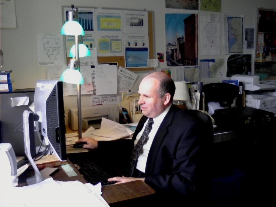 Buffalo News reporter Brian Meyer at his City Hall office desk