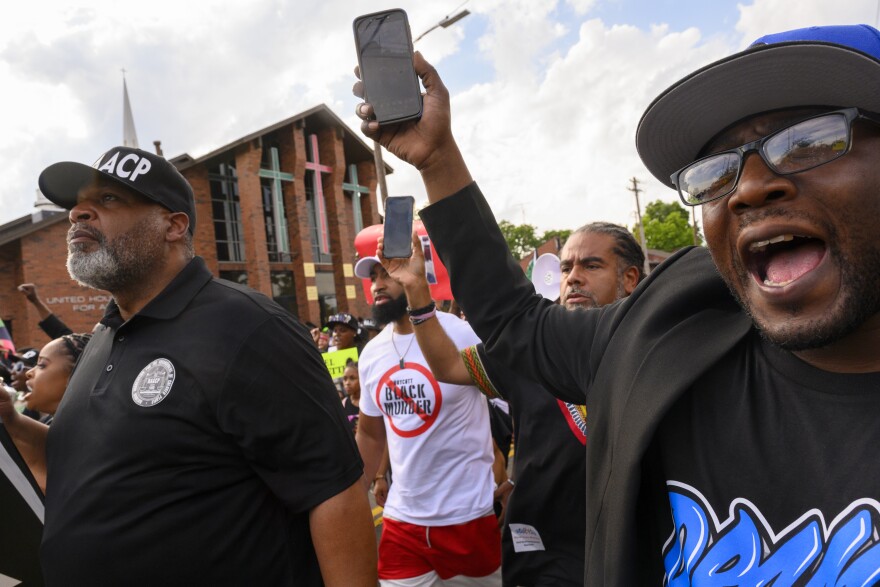 With shouts of 'If I say my neck is broke, don’t take it as a joke,’ hundreds march through the streets of New Haven in support of Randy Cox who was paralyzed while riding in an NHPD van.