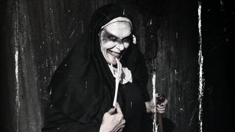 Meet many frightening characters like this nun up close (if you dare) at Medford's Nightmare Chamber Haunted House.