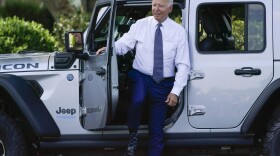 President Biden gets into Jeep Wrangler 4xe Rubicon on the South Lawn of the White House in Washington, on Aug. 5, 2021, during an event on clean cars and trucks. (Susan Walsh/AP)
