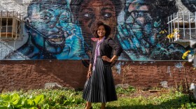 Keitra Bates stands outside of the original location of Marddy's in Atlanta. It's a shared kitchen where home cooks can prepare their goods, and collectively market them.